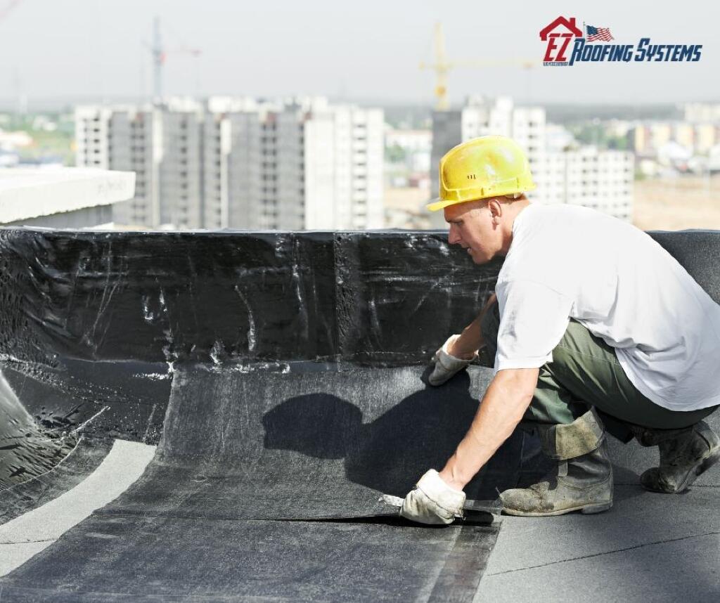 Flat Roof maintenance and installation by EZ Roofing Systems
